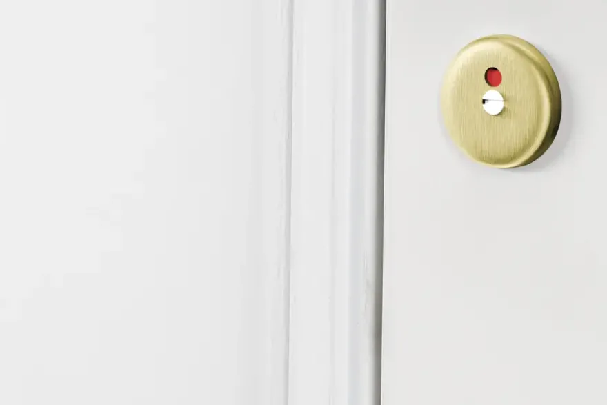 AXA binnendeurrozet klik met toilet-/badkamersclot rond goud