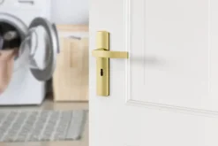 AXA deurkrukset Curve Blok goud blindschild klaviersleutel