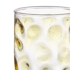 Glas met gele stippen
