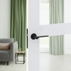 Karwei deurkruk set Warwick rond rozet zwart RVS